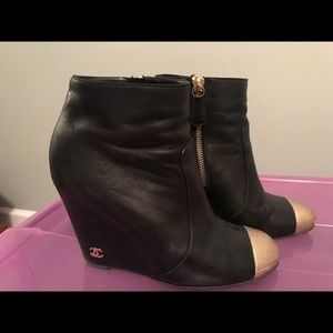Chanel leather wedge ankle bootie with gold toe.